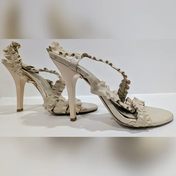 BCBGeneration Cream Ruffle Stiletto Heels - Picture 1 of 10